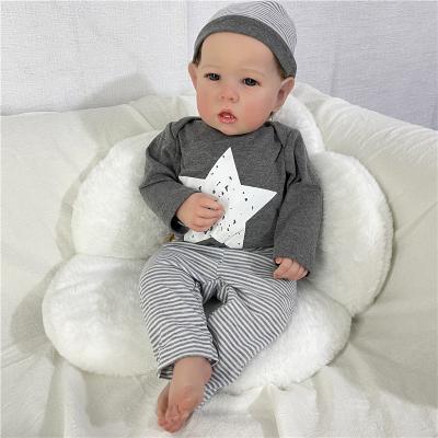 China Good Quality High Simulation Look Like Real 22inch 55cmRebirth Sitting Handmade Doll With Hat for sale