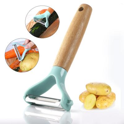 China Sustainable 2 in 1 Skin Premium Stainless Steel Swivel Potato Fruit Vegetable Peeler with Wooden Handle for sale