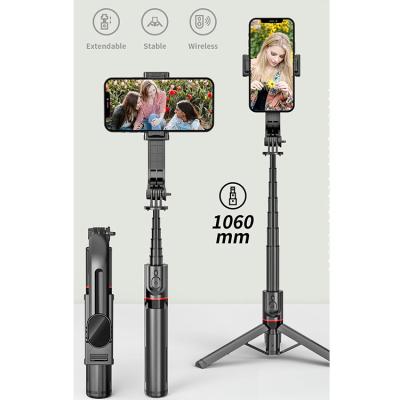 China Multi-Functional Lightweight Smart Wireless Selfie Stick Portable Xt02 Video Tripod Stand Holder For Mobile Phones for sale