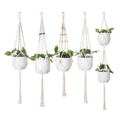 China Home Bohemian Decoration Plant Macrame Planter Basket Cotton Rope Handmade Flower Pot Rope Hanging Net for sale