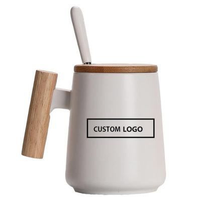 China Sustainable Ceramic Coffee Cup Tea Mug Tall Porcelain With Wooden Handle for sale