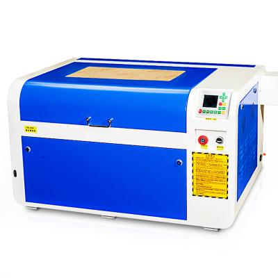 China Laser Engraving Reci Tube 80w Laser Engraving Machine Laser Cutting Machine 40cm*60cm Rubber Stamp Machine Price for sale