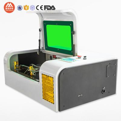 China Laser Engraving 4030 400*300mm Laser Engraving Machine, Phone Case Shell Stamp Seal Wood Engraving Machine for sale