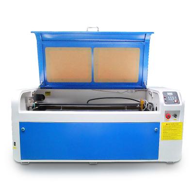 China Laser CUT CO2 80W Laser Engraving Machine 1040 For Wood Fabric Laser Cutting Machine Price From Ghana for sale