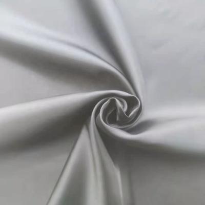 China Waterproof Environmental Friendly Recycled 300T Polyester Taffeta Fabric For Garment And Bag Lining for sale