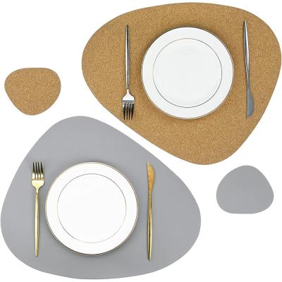 China Costom Sustainable Oval Leather Place Mats And Coaster Set Washable Dining Table Mat for sale