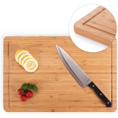 China Sustainable Cutting Board Bamboo Antiseptic Wooden Board With Juice Groove 2 Sizes for sale