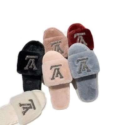 China New fashion trend autumn and winter fashion fur slippers ladies plush home slippers for sale