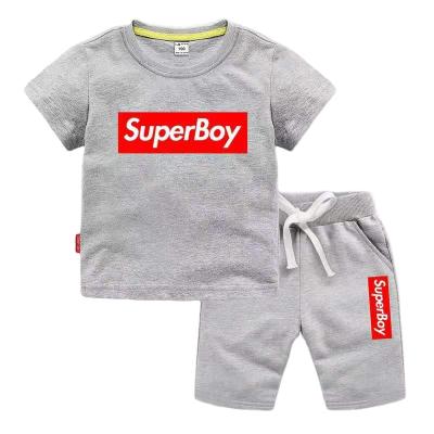 China 2021 summer boy casual clothing set custom logo printing embroidery children's sports suit kids short boy cotton tide for sale