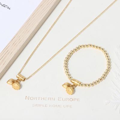 China Gold Plated Ball Necklace Bracelet Jewelry Set Ethnic Pendant Lotus Design Elegant Cooper Design With Cheap Price for sale