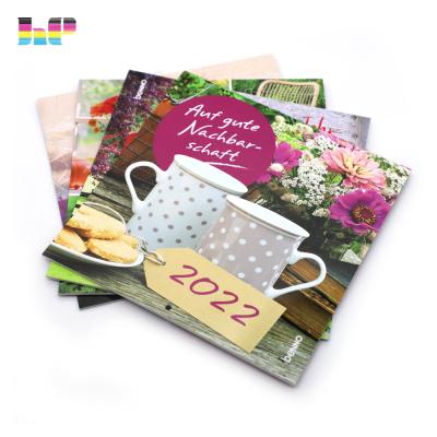 China Custom High Quality Wall Calendar Book Printing Offset Printing Film Lamination Wall Calendar Printing for sale