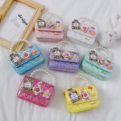 China Fashion Personalized Little Girl Cross - Body Flower Purse Mini Toddler Pearl Purse Shoulder Handbags With Chain for sale