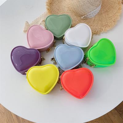 China 2021 New Fashion Summer Jelly Mini Handbags Kids PVC Heart Macron Color Coin Shoulder Clips Candy Color Chian Cross - Body Bolsa for sale