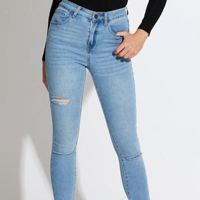 China New fashion women breathable denim distressed jeans flare high rise ripped jeans 2022 waist women blue straight leg mom jeans high tops for sale