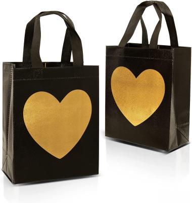 China Customized Recyclable Bulk Nonwoven Reusable Gift Bags With Shiny Gold Heart Print For Cakes Or As Shopping Bags for sale