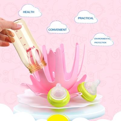 China Minimalist Baby Bottle Holder Nipple Bottle Brush Holder Plastic Detachable Flowing Quick Drying Convenient Holder for sale