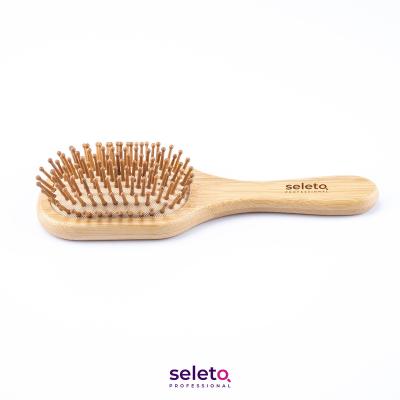 China Professional Custom Fancy Round Logo Bamboo Curling Hair Brush Detangle Professional Waterproof Fancy Salon Extra Long Home Use Stying Tool Making for sale