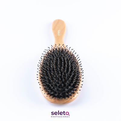 China Home Palette Around Detangling Wooden Magic Brush Bamboo Hair Comb In Yiwu for sale