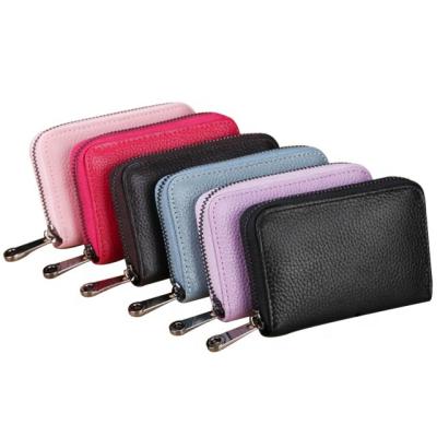 China RFID Women's Pink Credit Card Holder Genuine Leather Zippered Wallet with 12 Card Slots and 2 Cash Slots for sale