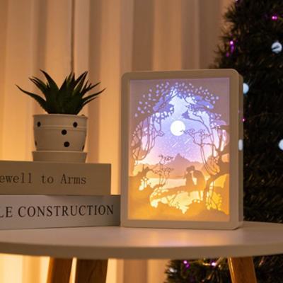 China Colorful Europe Lamp LED Light Laser Paper Carving Cutting Poses 3d Music Picture Frame For Home Decoration for sale