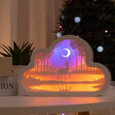 China Modern Creative 3D Table Lamp Led Paper Carving Light For Christmas Holiday Decoration Gift for sale