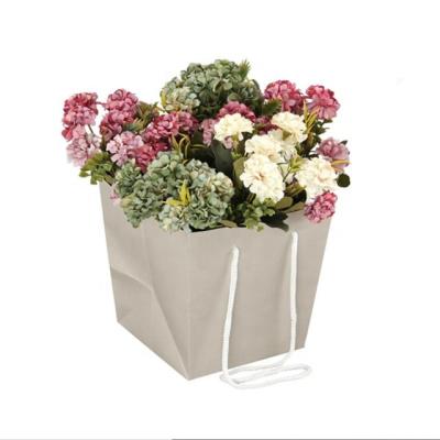 China Creative Recycled Materials 2021 New Flower Basket Shape Gift Box Packaging Bags Flat Square Rectangle Paper Carrier Bags for sale