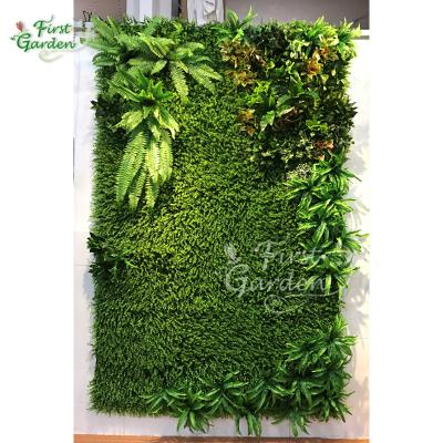 China Eco-friendly Artificial Green Leaves Foliage Plants Decoration Grass Fern Wall Panel Backdrop Vertical Garden Plastic for sale