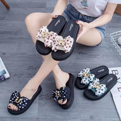 China Fashion Trend New summer muffin bottom slippers women wear bow thick bottom non-slip slippers for women for sale