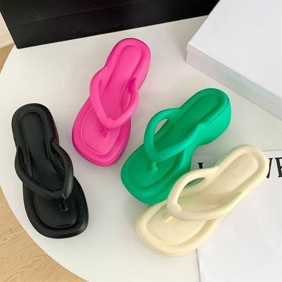 China Fashion Trend Flip-Flops women's thick-soled height-increasing flip-flops for outer wear summer -on feeling beach pers for sale