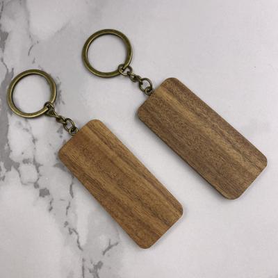 China Blank Wooden Key Chain Keychains Handcrafted Simple Key Ring Holder Wood Craft Keepsake for sale