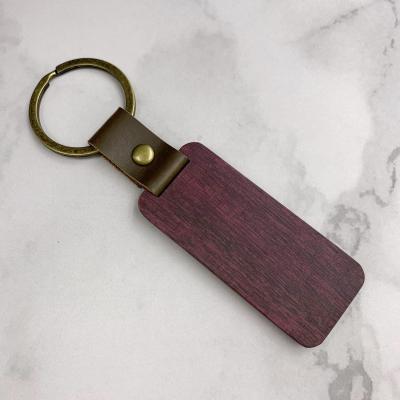 China Engravable Handcrafted Wooden Key Chain Blank Wooden Craft Solid Wood Birthday Gift for sale