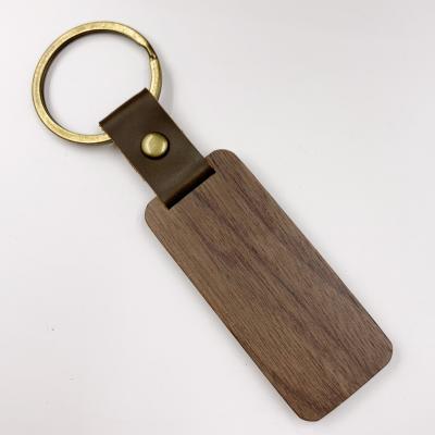 China Wooden Key Chain Wooden Blank Handcrafted Wooden Craft Solid Wood Keychain for sale