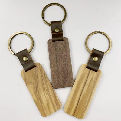 China Wood Customized Laser Engrave Wooden Craft Souvenir Keychains DIY Blank Key Chain Single Key Ring Holder for sale