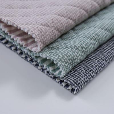 China Hot Sale Tear-Resistant Yarn Dyed Knit Jacquard Check Sandwich Heavyweight TC Uniform Soft Fabrics for sale