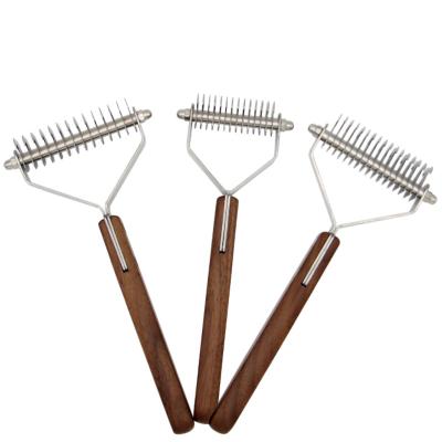 China Stocked Quickly Detangle Tangled Cat Hair Removal Comb Brush Solid Wood Knot Hair Style Dogs Pet Fur Knot Cutter Retro for sale