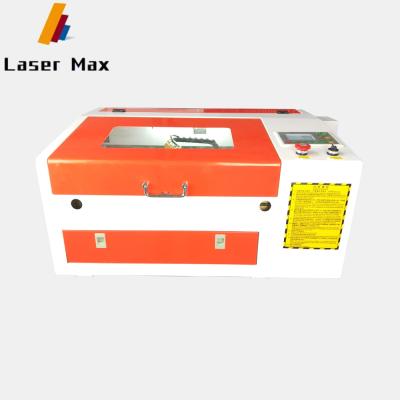 China Laser Engraving Small Mini CO2 Laser Engraving Electric Ruida 6442s Controller for sale