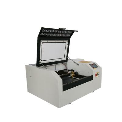 China M2 Laser System Mini Engraver Machine 50w Corellaser Coreldraw Engraver Glass Desktop Plywood Laser Engraver Cutter for sale