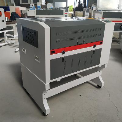 China Water Cooled Wood Acrylic Plywood MDF Laser Cutting Machine 100W Laser Leather Engraver LM4060L for sale