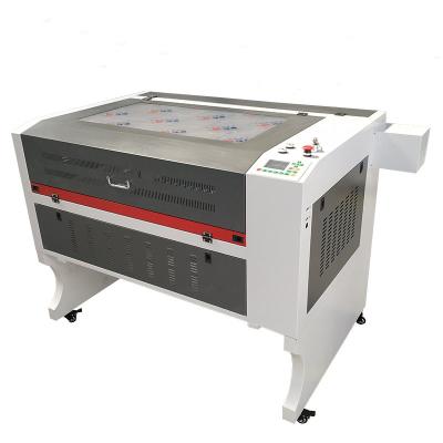 China Laser Engraving Laser Engraver LM6090 80W 100W With CCD Camera For Cutting Patterns CE Certificated for sale