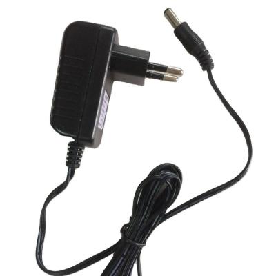 China PC CE RHOS UK AC DC Power Adapter Irig 1A Flame Retardant Material Adapter With Interchangeable Plug for sale