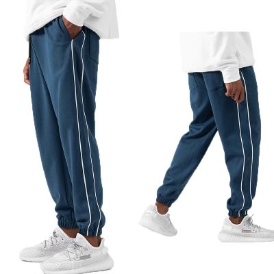 China Unisex Anti-Wrinkle Sweatpants Jogging High-waisted Custom Gym Sports Jogger Plus Size Organic Cotton Loose Sweat Men's Pants And Trousers for sale