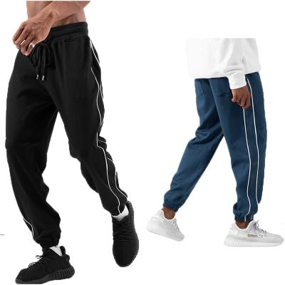 China Custom Breathable Pocket Cotton Spandex Men Loose Plus Large Jogging Pants Gym Fitness Training Cargo Pants Jogging Pants for sale