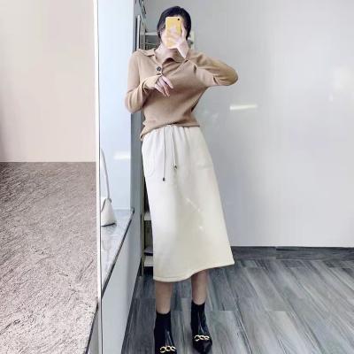 China 2021 new wholesale women's anti-static tape side ribbon sheer pocket women's skirt knee-length high elastic waist length mid-waist skirt for sale