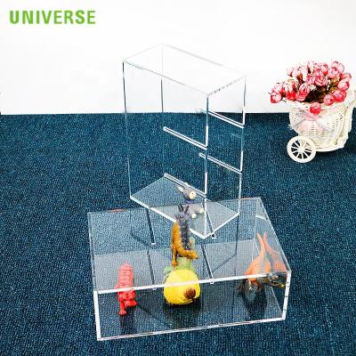 China Custom Acrylic Plug-in Type Eco-Friendly and Handmade UNIS Three-Dimensional Transparent Toy Display Stand for sale