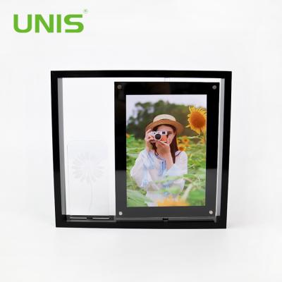 China Wholesale Handmade New Design Modern Acrylic Black Magnetic Rotating Acrylic Photo Frame Resin Frame UNIS Resin Picture Frame On Table for sale