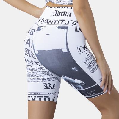 China Newspaper design fashion fitness and yoga wear breathable sexy leggings for women leggings waist yoga pants tiktok leggings shorts pants high top for sale