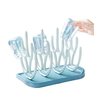 China BPA Free Wholesale Coral Drying Detachable Baby Bottle KUB Drying Rack for sale