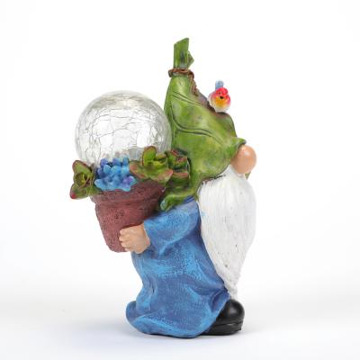 China Outdoor Garden Gnome Statue Decoration Resin Gnome Figurine Carrying Magic Globe with Solar LED Lights for Patio Yard Lawn Porch for sale