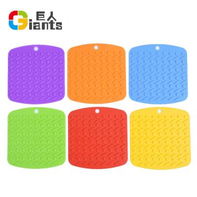 China 6 Color Non-Slip Workable, Silicone Heat Resistant Pot Holder, Tripods, Hot Mitts, Spoon Rest and Garlic Peeler for sale