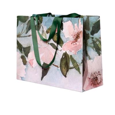 China Custom Materials Luxury Recycled Retail Clothing Bag Packing Gift Bag Bolsas De Paper Shopping Pink Packaging Paper Bags With Handles For Clothes for sale